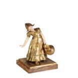•CHARLOTTE MONGINOT (1872 - 1962); A GILT BRONZE AND IVORY SCULPTURE: "GIRL WITH PAIL"