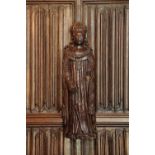 A NETHERLANDISH OAK FIGURE OF A BISHOP, CIRCA 1480