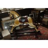 A SPECIAL MILLENNIUM LIMITED EDITION ROCKING HORSE