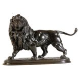 A FRENCH ANIMALIER BRONZE FIGURE OF A PACING LION