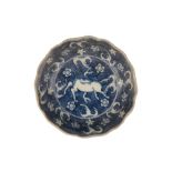 SMALL FOLIATE-FORM BLUE AND WHITE SAUCER DISH, XUANDE MARK BUT MID-17TH CENTURY