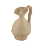 WHITE-GLAZED MINIATURE XING STYLE PEAR-SHAPED EWER, FIVE DYNASTIES / SONG DYNASTY