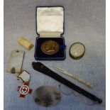 A MEDAL OF SIR RICHARD BURBIDGE, Chairman of Harrods 1945-59, in a fitted presentation case and a