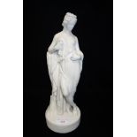 A VICTORIAN PARIAN WARE STUDY OF A WOMAN in Classical costume, 37cm high