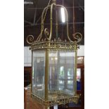A VICTORIAN BRASS HALL LANTERN with bevelled glazed panels
