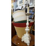 A LARGE TABLE LAMP in the form of an altar candlestick and a collection of lamp shades