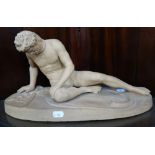 A 19TH CENTURY TERRACOTTA STUDY; 'THE DYING GAUL' (with figleaf), 42cm wide