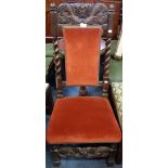 A CAROLEAN OAK CHAIR, with carved foliage and crown and spiral turnings with velvet upholstery