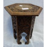 A SMALL VICTORIAN CARVED OAK 'PERSIAN' TABLE, 29cm high