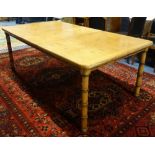 AN OAK PARQUETRY TOP EXTENDING DINING TABLE, with simulated bamboo legs, with one leaf, 107cm x