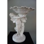 A WHITE GLAZED SPODE COMPORT, supported by a fairy, 41cm high