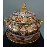 A LARGE 19TH CENTURY IMARI TUREEN AND COVER with matching plate, probably Derby