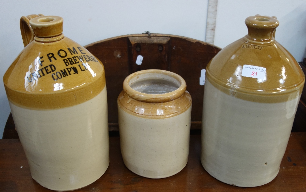 A 'FROME UNITED BREWERIES' GLAZED STONEWARE FLAGON another similar and a storage jar (3)