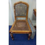 A 19TH CENTURY OAK GOTHIC REVIVAL SIDE CHAIR, with cane seat, with blind tracery panelled seat rail,