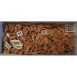 A COLLECTION OF TOY TERRACOTTA HOUSE BRICKS