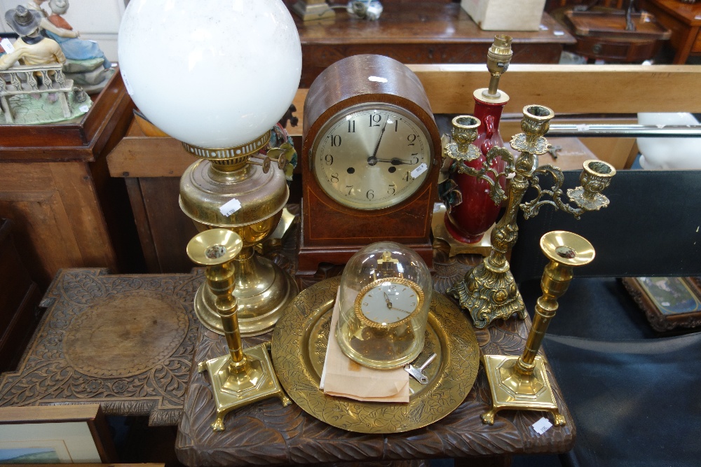 A 1920S MANTEL CLOCK, a pair of brass candlesticks, table lamps and sundries