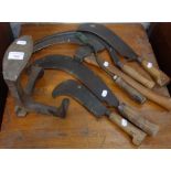 A COLLECTION OF VINTAGE HAND TOOLS to include scythes