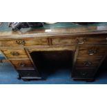 A REPRODUCTION GEORGE II STYLE MAHOGANY KNEEHOLE DESK, with central cupboard and leather top, 95cm