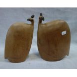 A PAIR OF STYLISED AFRICAN WOODEN BIRD STUDIES, 23cm high