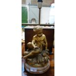 A TABLE LAMP decorated with a gilt cherub on an alabaster base