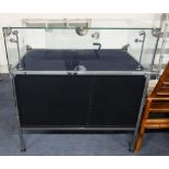 A CHROME SHOP DISPLAY CABINET with plate glass top and sides, 99cm wide x 60cm deep x 104cm high
