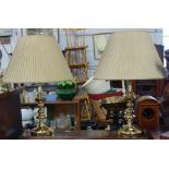 A PAIR OF CONTEMPORARY BRASS TABLE LAMPS with pleated shades