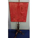 A GEORGE III MAHOGANY POLE SCREEN, on tripod stand