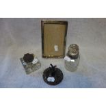 A VICTORIAN SILVER TOPPED AND CUT GLASS INK WELL, a cut glass scent bottle with silver collar, a