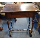 A WILLIAM AND MARY WALNUT SIDE TABLE, with turned and faceted legs and stretchers, fitted a frieze