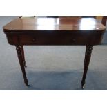 A REGENCY MAHOGANY FOLD-OVER TOP TEA TABLE, fitted a drawer, on turned legs, 102 cm wide