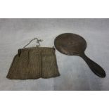 A SILVER BACKED HAND MIRROR, and a white metal mesh evening bag (c. 5.3oz)