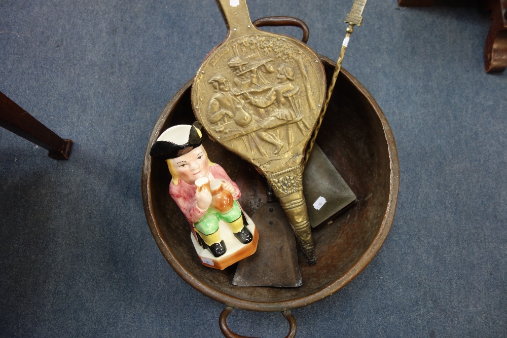 A LARGE 19TH CENTURY COPPER PAN, a pair of bellows and sundries