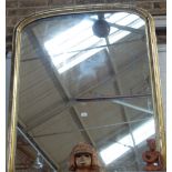 A VICTORIAN GILT FRAMED OVERMANTLE MIRROR of arched form, 110cm wide 130cm high