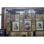 A COLLECTION OF VICTORIAN CARTE DE VISITE AND CABINET PHOTOGRAPHS mounted in a maple frame and