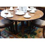 A WILLIAM IV MAHOGANY EXTENDING DINING TABLE, with pull-out action on six turned and reeded legs,