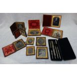 A COLLECTION OF AMBROTYPE PHOTOGRAPHS and a drawing set in a fitted presentation case
