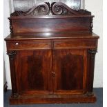 A WILLIAM IV MAHOGANY CHIFFONIER, with ogee arch panelled doors and carved back, 116cm wide