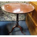 A GEORGE III MAHOGANY TRIPOD TABLE, with dished top, 62cm diameter