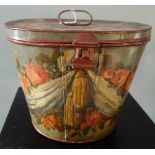 A 19TH CENTURY TIN HAT BOX with floral painted decoration