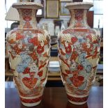 A PAIR OF LARGE JAPANESE VASES decorated with warriors, 49.5cm high