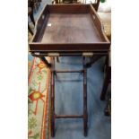 A REPRODUCTION MAHOGANY BUTLER'S TRAY AND STAND, 66cm wide