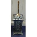 A VICTORIAN CAST IRON CONSERVATORY HEATER (converted to a lamp)