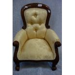 A VICTORIAN STYLE MAHOGANY CHILD'S ARMCHAIR upholstered in gold brocade