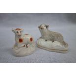 A 19TH CENTURY STAFFORDSHIRE SHEEP and another similar