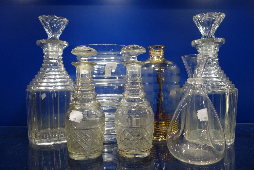 A PAIR OF 19TH CENTURY CUT GLASS DECANTERS and similar glassware