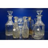 A PAIR OF 19TH CENTURY CUT GLASS DECANTERS and similar glassware