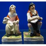 A PAIR OF 19TH CENTURY STAFFORDSHIRE FIGURES of an old woman and a man