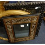 A VICTORIAN PAINTED PINE CHIP CARVED MIRROR FRAME, a Persian mirror frame and an oval gilt mirror