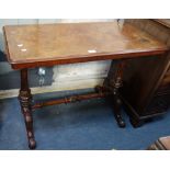 A VICTORIAN WALNUT CENTRE TABLE, with carved legs, 90cm wide