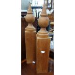A PAIR OF 19TH CENTURY TURNED PINE COLUMNS, 55cm high